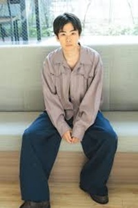 インタビュー写真の黒崎